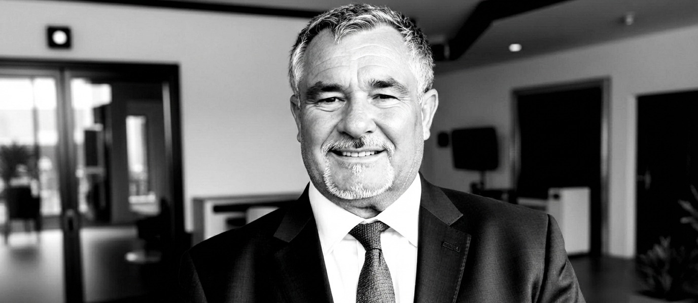 Dave Miller in a suit, black and white portrait
